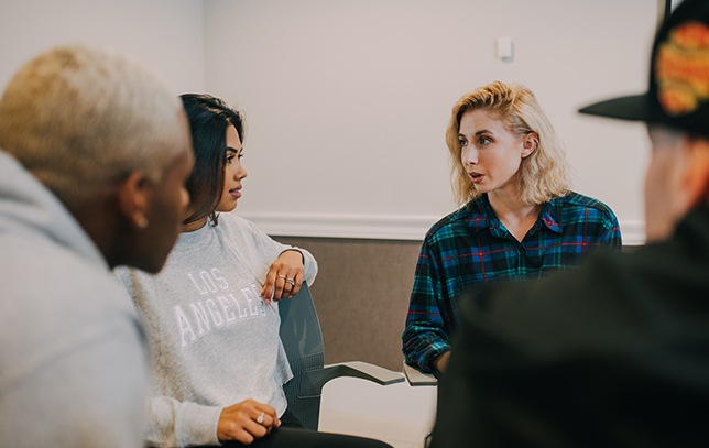 family talking to a doctor