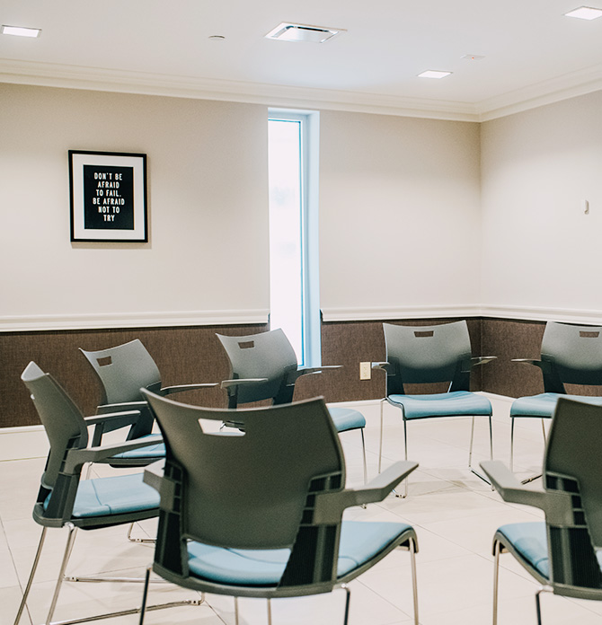 chairs in a circle waiting on patients for a group therapy session